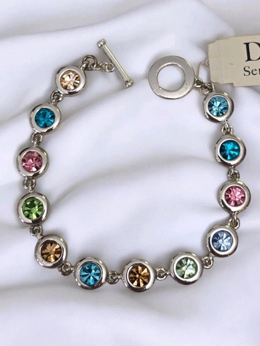 Dillard’s Multicolor Crystal Tennis Bracelet Silver Tone 8" Toggle NWT W / Box